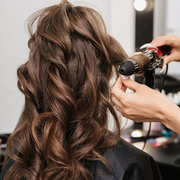 Mastering Curls: A Pro's Guide to Using a Hair Curling Iron on Extensions